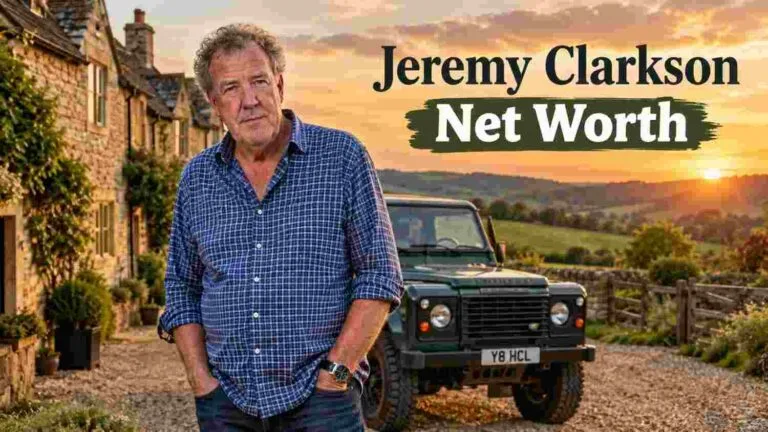 Jeremy Clarkson standing in front of his Cotswolds farmhouse and green Land Rover at sunset – Jeremy Clarkson net worth 2025