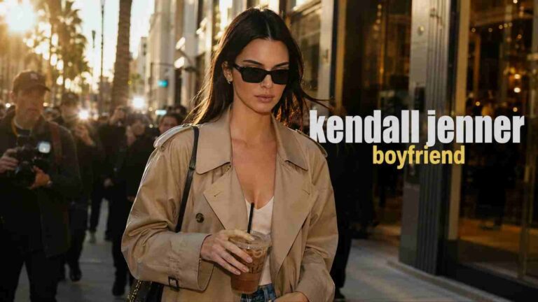 Kendall Jenner boyfriend – Kendall Jenner spotted walking on the street wearing a beige trench coat and sunglasses while holding an iced coffee, surrounded by paparazzi